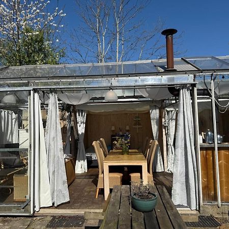 Vrijstaande Accommodatie Glamping De Kas Inn Hank Esterno foto