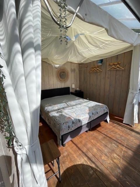 Vrijstaande Accommodatie Glamping De Kas Inn Hank Esterno foto